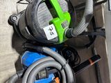 a picture of a room with a vacuum and a dryer