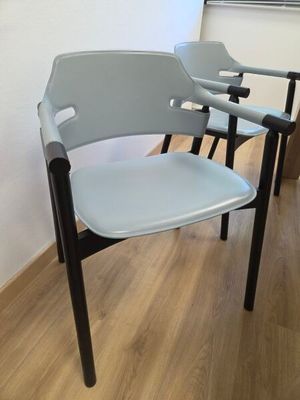 three chairs that are sitting next to each other on the floor