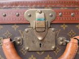 a close up of a suitcase with a handle on it