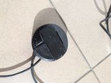 an image of a cord plugged into a wall outlet