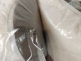 a pair of shoes that are wrapped in plastic