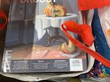 a magazine in a box with a red ribbon around it
