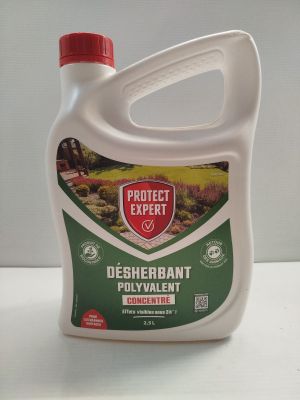 un gros plan sur une bouteille de produit anti-nuisibles posée sur une table