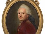 portrait of a man in a red coat and white hair