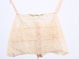 an image of a white bra top hanging on a black hanger