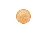a close up of a gold coin on a white background