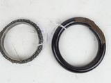two rings that are sitting next to each other on a table