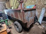 a dump truck that is parked in a garage