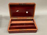 a small wooden box that has two compartments inside of it