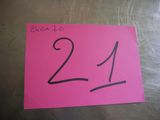 a pink post it note with the number 21 on it
