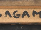 a sign that says maga on the side of a building