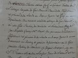 a piece of paper with writing on it sitting on a table