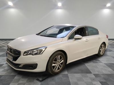 the white car is parked on a checkered tile floor