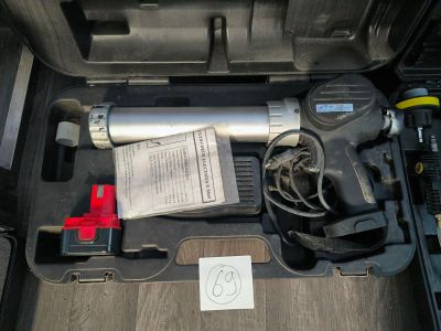 a tool in the trunk of a car that is packed with tools