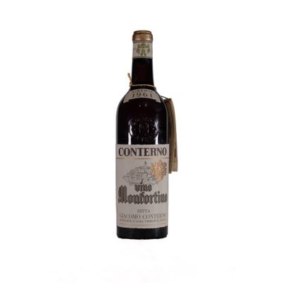 an old bottle of wine with a tag on it