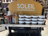 a shelf with a lot of jars on it in a store