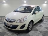 a picture of a white opel parked in a room