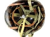 an overhead view of a helmet with a strap around the vise