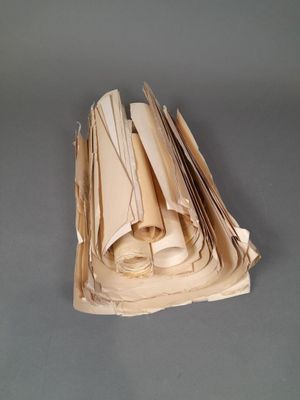 a stack of papers sitting on top of a table