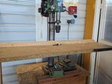 a machine that is sitting on top of a wooden table