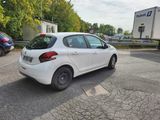 a white car that is parked in the parking lot