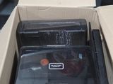 a box with a laptop inside of it sitting on a table
