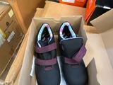 a box with a pair of shoes inside of it