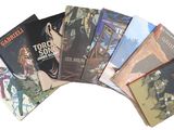 un grand nombre de livres posés sur une table
