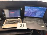 two laptops that are sitting on a desk
