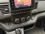 the dashboard of a car with a car radio and a steering control