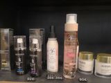 many different types of skin care products displayed on a shelf