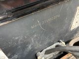 a metal box that has some tools inside of it