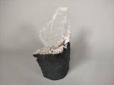 crystal in a rock on a white background