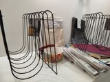 two wire baskets that are on a table