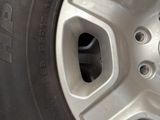 a close up of a tire on a car