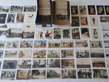 beaucoup de vieilles photos posées sur une table, à côté d'un livre