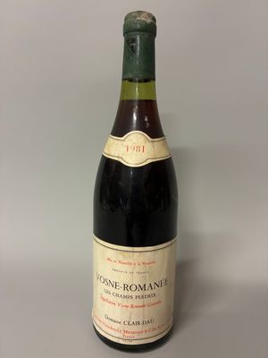 a bottle of wine that is sitting on a table