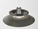 a light that is hanging from a ceiling in a room