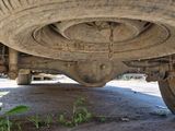 a close up view of a car ' s tire on the ground