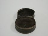 a small metal box that is sitting on a table
