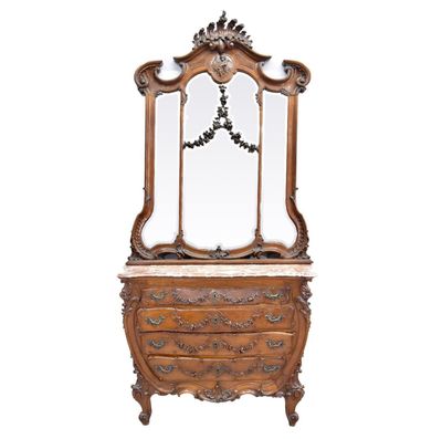 an image of a dresser with a mirror on top of it