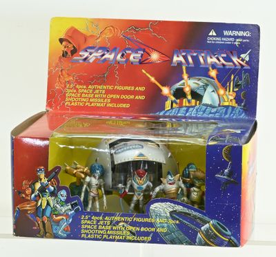a box of space attack action figures in it
