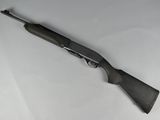 a gun that is laying on top of a table