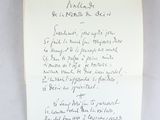 an old letter written in french on a piece of paper
