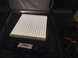 a box with a light inside of it on a table