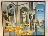 un tableau accroché au mur d'une pièce où se trouvent des personnes