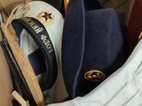 a box with a hat, gloves, and other items in it