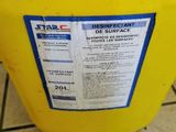 a yellow container with a label on it sitting on a tiled floor