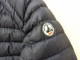 the jacket is black and has a panda patch on the back