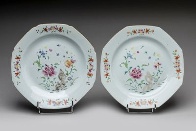 pair of chinese porcelain plates with flowers and birds on them